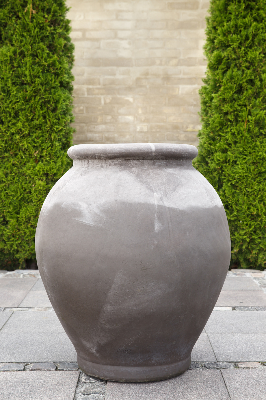 Large grey amphora-shaped outdoor pot.