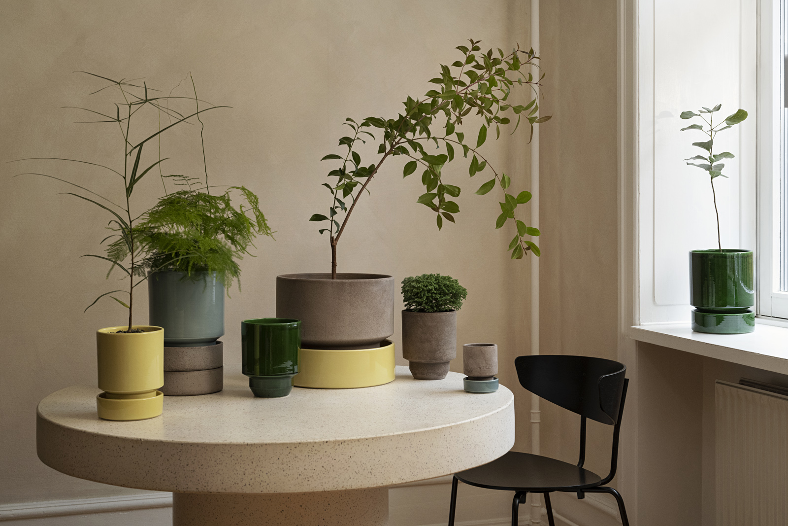 Bergs Potter Hoff Collection. Pots and cachepot Grey raw terracotta, emerald green, pale yellow and misty blue